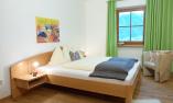 Apartment Jonathan - Schlafzimmer mit Doppelbett