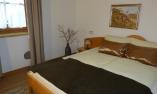 Apartment Grafensteiner - Schlafzimmer mit hochwertigem Eicheholzboden